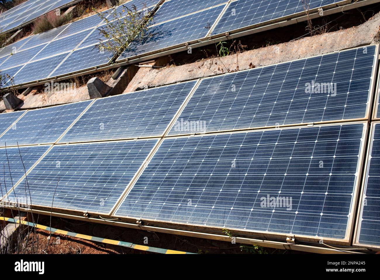 Dusty solar panels surface requires maintenance and cleaning. Solar