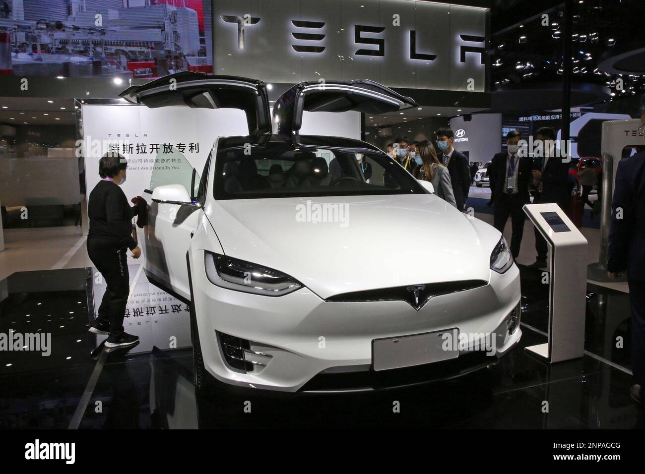 A booth of Tesla, an American electric vehicle company, is pictured