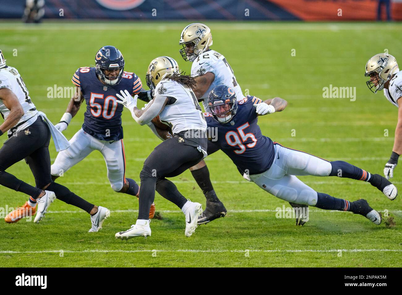 November 01, 2020: Chicago, Illinois, U.S. - Bears #11 Darnell Mooney is  tackled by Saints #20 Janoris Jenkins during the NFL Game between the New  Orleans Saints and Chicago Bears at Soldier