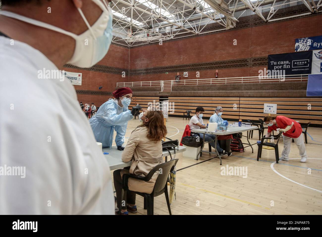 A neighbour from the basic health area of San Juan de la Cruz leaves to