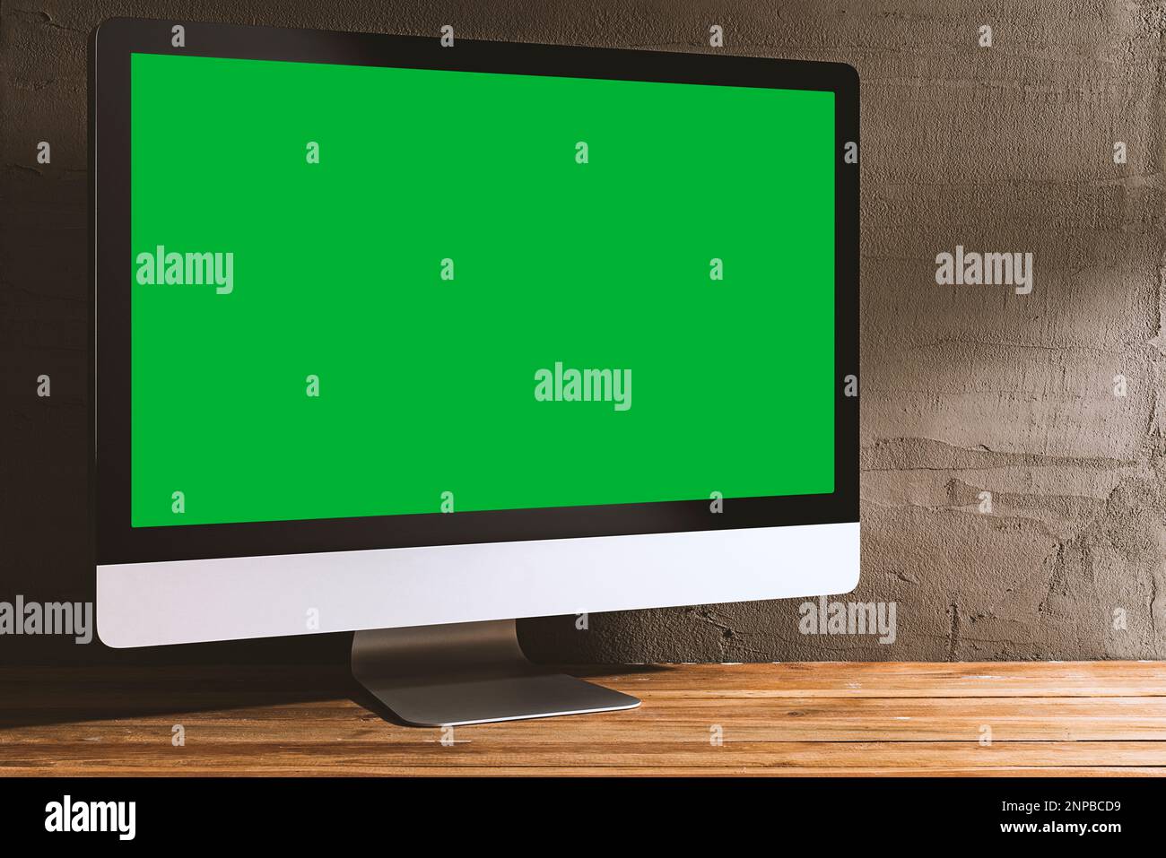 Chroma key green screen computer, digital display on table. Table top