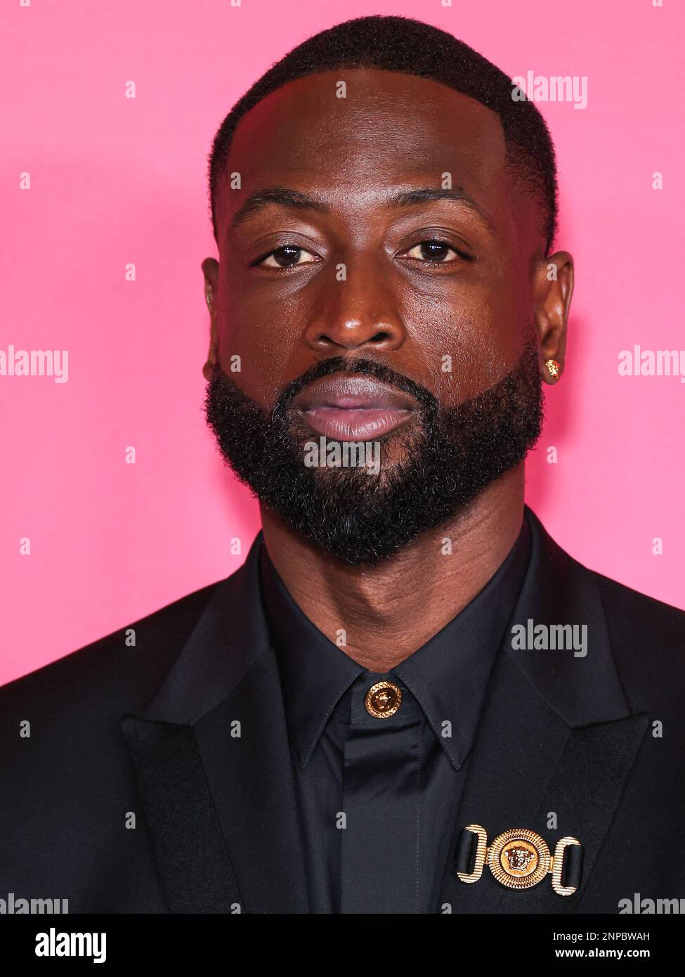 Pasadena, United States. 25th Feb, 2023. PASADENA, LOS ANGELES, CALIFORNIA, USA - FEBRUARY 25: American former professional basketball player Dwyane Wade, recipient of the President's Award wearing Versace poses in the press room at the 54th Annual NAACP Image Awards held at the Pasadena Civic Auditorium on February 25, 2023 in Pasadena, Los Angeles, California, United States. (Photo by Xavier Collin/Image Press Agency) Credit: Image Press Agency/Alamy Live News Stock Photo