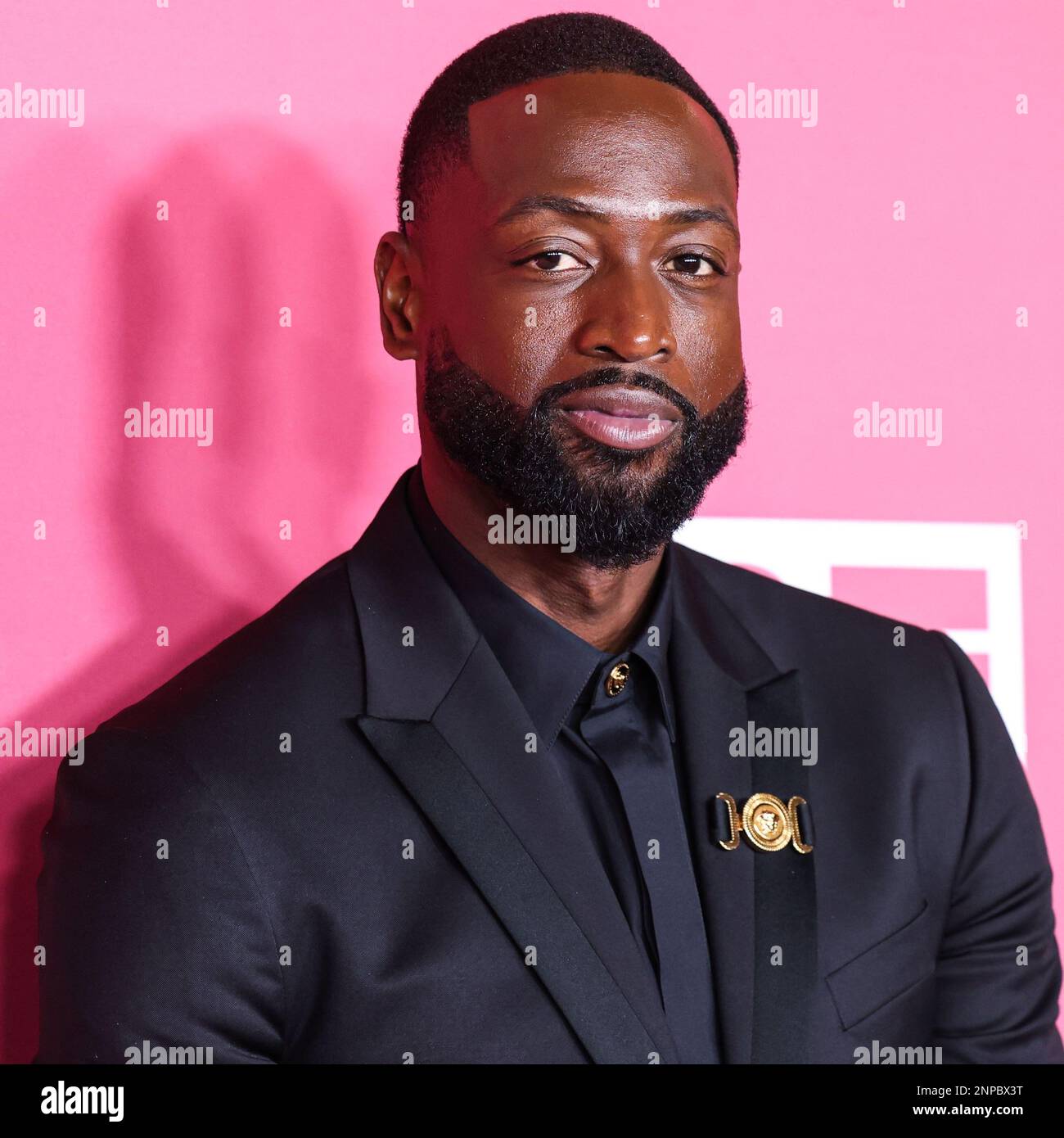Pasadena, United States. 25th Feb, 2023. PASADENA, LOS ANGELES, CALIFORNIA, USA - FEBRUARY 25: American former professional basketball player Dwyane Wade, recipient of the President's Award wearing Versace poses in the press room at the 54th Annual NAACP Image Awards held at the Pasadena Civic Auditorium on February 25, 2023 in Pasadena, Los Angeles, California, United States. (Photo by Xavier Collin/Image Press Agency) Credit: Image Press Agency/Alamy Live News Stock Photo