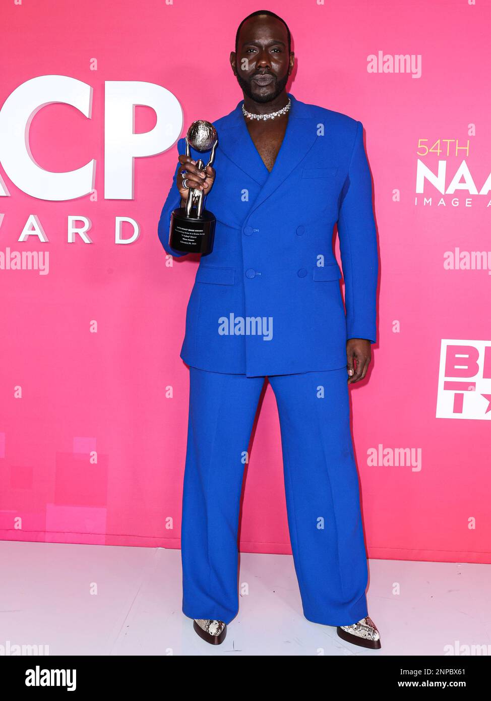 Pasadena, United States. 25th Feb, 2023. PASADENA, LOS ANGELES, CALIFORNIA, USA - FEBRUARY 25: Nicco Annan, winner of the Outstanding Actor in a Drama Series award for 'P-Valley' poses in the press room at the 54th Annual NAACP Image Awards held at the Pasadena Civic Auditorium on February 25, 2023 in Pasadena, Los Angeles, California, United States. (Photo by Xavier Collin/Image Press Agency) Credit: Image Press Agency/Alamy Live News Stock Photo