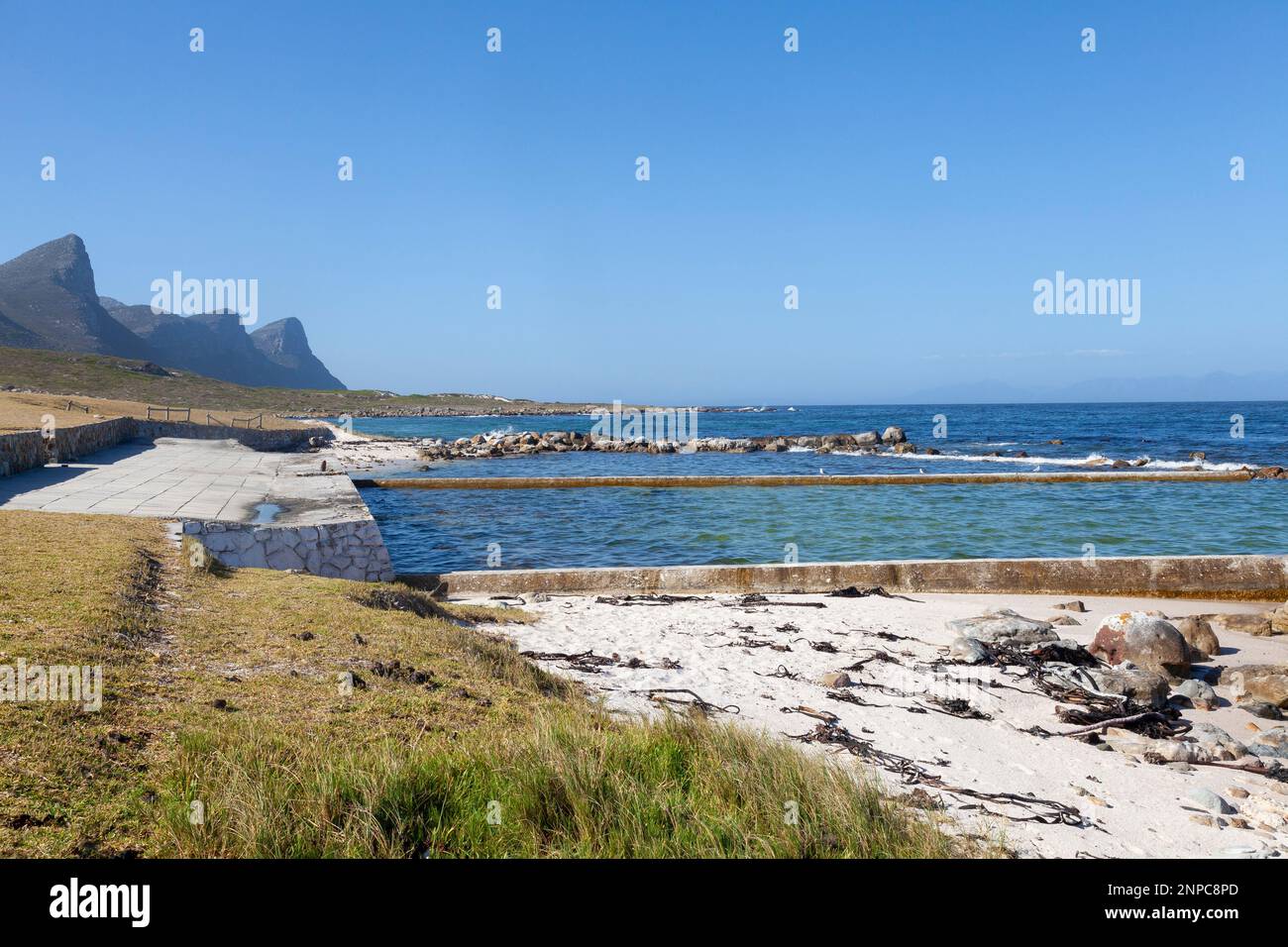 The tidal pool and picnic site at Buffels Bay Beach, Cape Point Nature Reserve, Cape Peninsula, Western Cape, South Africa Stock Photo