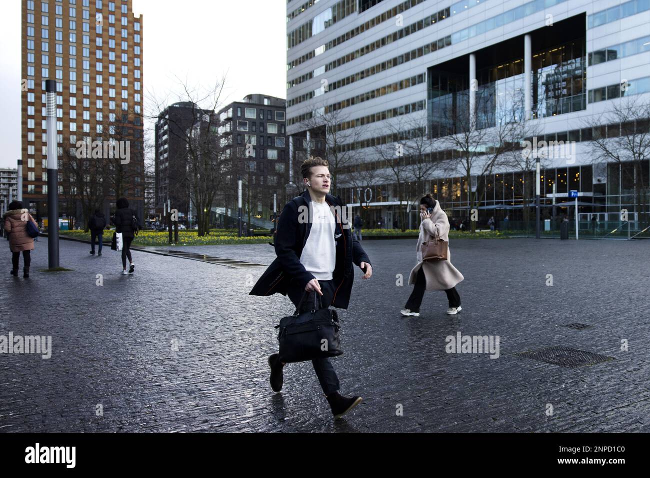 AMSTERDAM Employees of companies on the Zuidas leave their work, the
