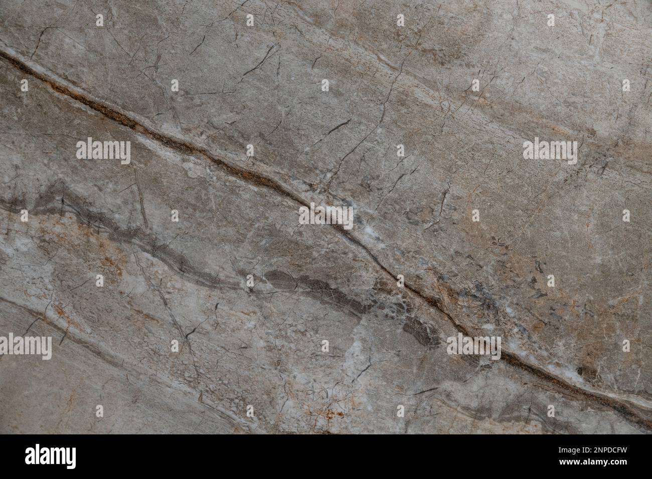 Brown marble pattern with swirling lines and uneven streaks, in natural brown and beige colors, smooth and glossy background resembling marble stone Stock Photo