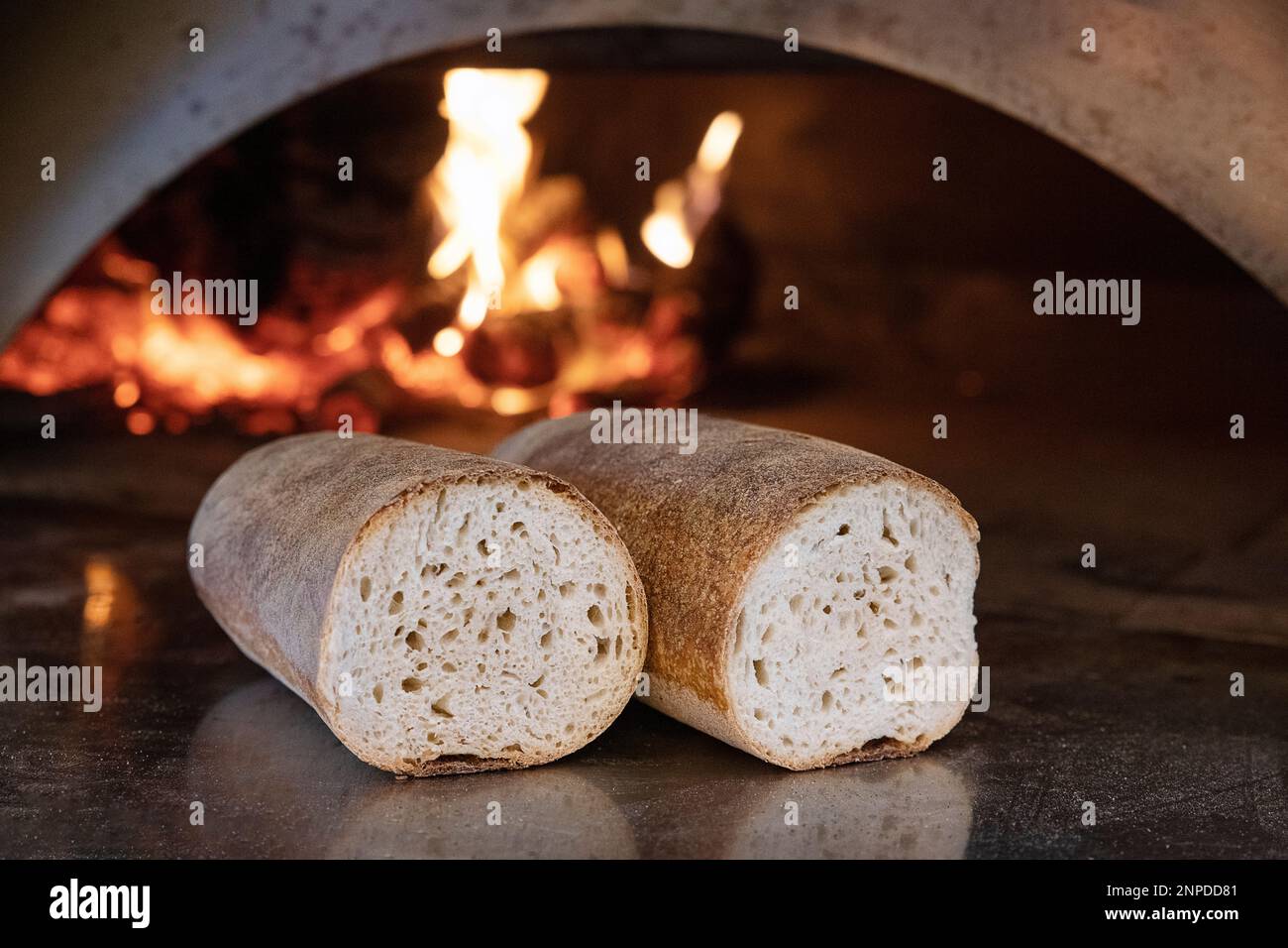 Delicious artisanal sourdough bread with thick golden crust and