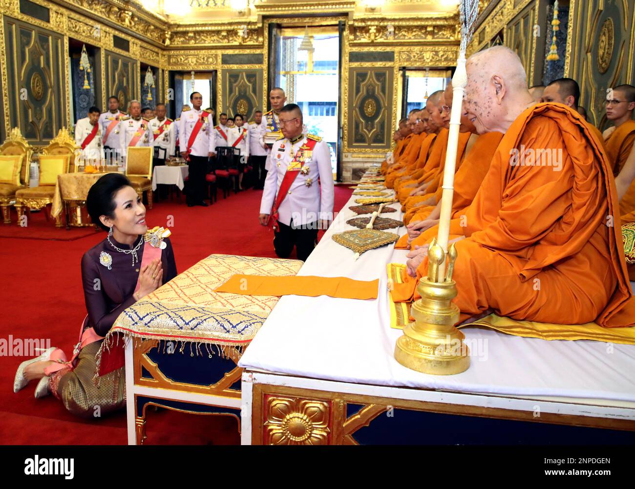Thai royal noble consort Sineenatra Wongvajirabhakdi talks to monk
