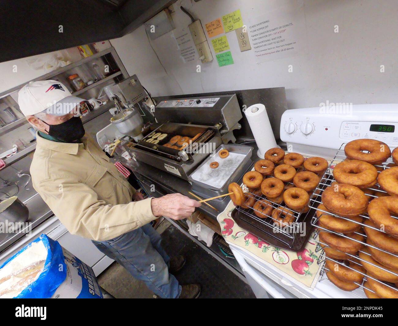 David Jurczak makes apple cider doughnuts at Lakeview Orchard in