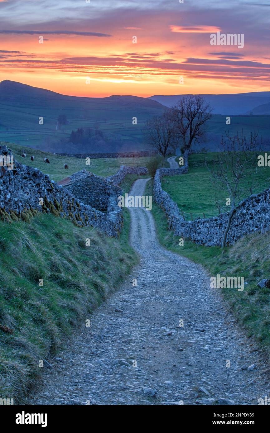 Sunset over Goat Scar lane above Stainforth in Ribblesdale Stock Photo