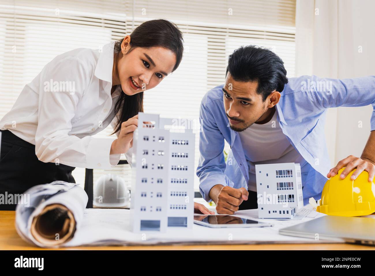 Architect team in office, engineer designers working in Office check and explaining project plan Stock Photo