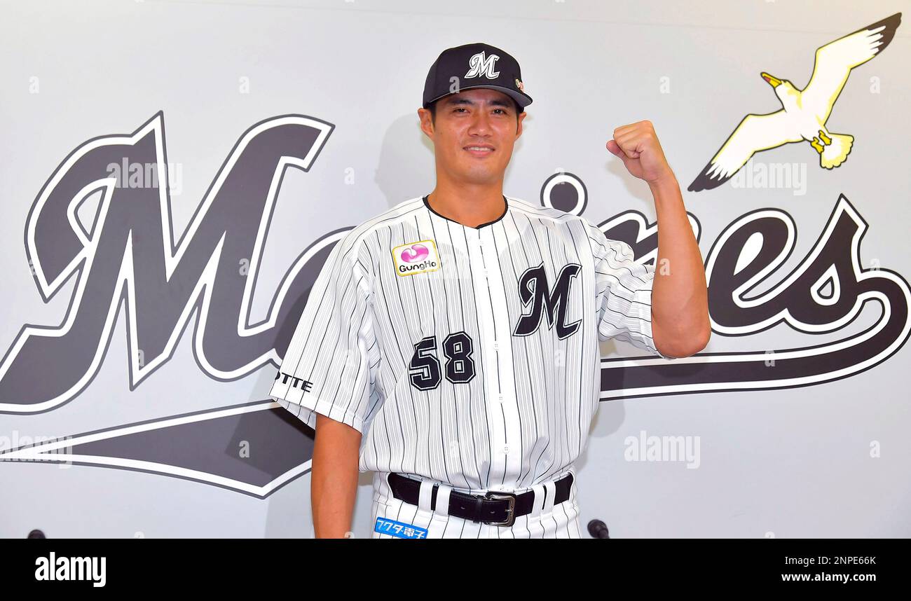 Wei-Yin Chen, a Taiwanese professional baseball pitcher, attends a press conference to announce joining the Chiba Lotte Marines in the Nippon Professional Baseball (NPB) at ZOZO Marine Stadium in Chiba on October