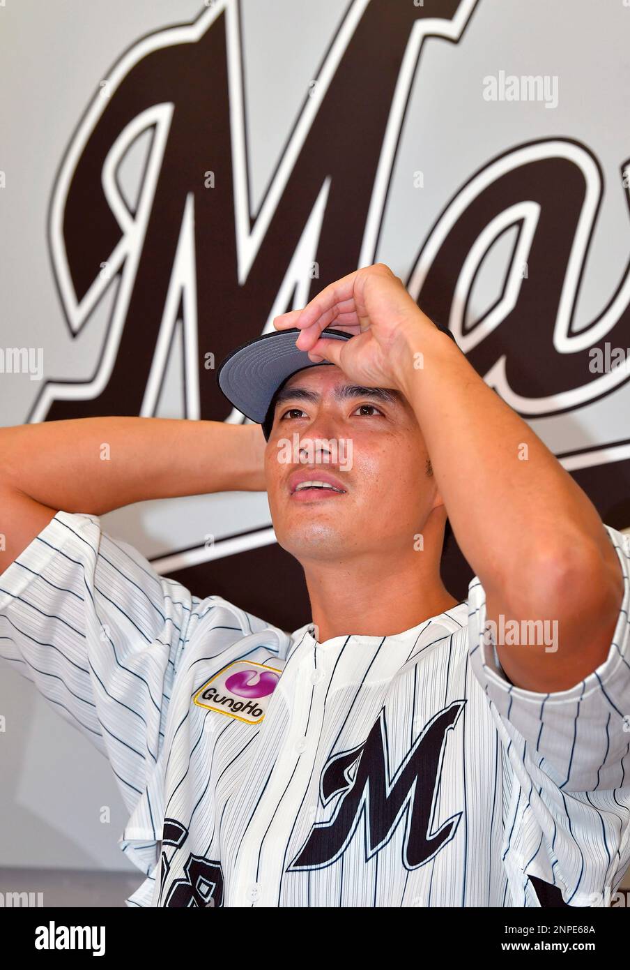 Wei-Yin Chen, a Taiwanese professional baseball pitcher, attends a press conference to announce joining the Chiba Lotte Marines in the Nippon Professional Baseball (NPB) at ZOZO Marine Stadium in Chiba on October