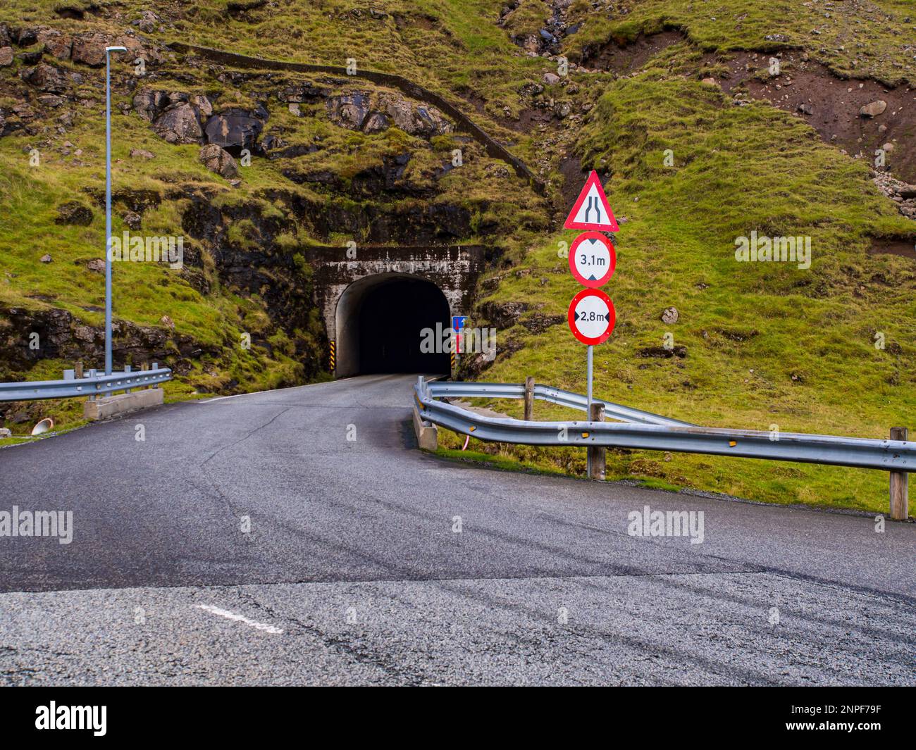 Tunnel via the mountains in the Faroe Islands. Tunnels and bridges are
