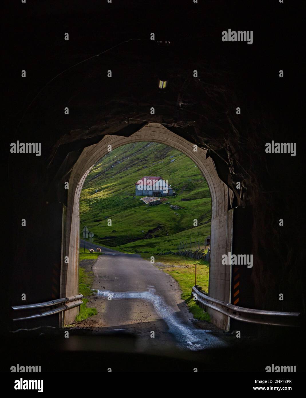 Tunnel via the mountains in the Faroe Islands. Tunnels and bridges are