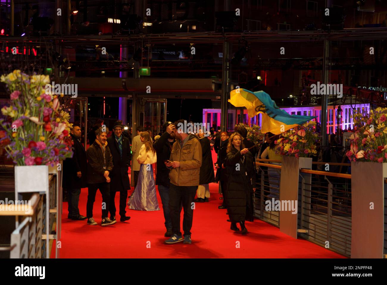 February 25, 2023, Berlin, Berlin, Germany: Diana Berg waves a Ukrainian flag as she arrives for the closing ceremony of the 73rd Berlinale International Film Festival Berlin at Berlinale Palast on February 25, 2023 in Berlin, Germany (Credit Image: © Beata Siewicz/Pacific Press via ZUMA Press Wire) EDITORIAL USAGE ONLY! Not for Commercial USAGE! Stock Photo