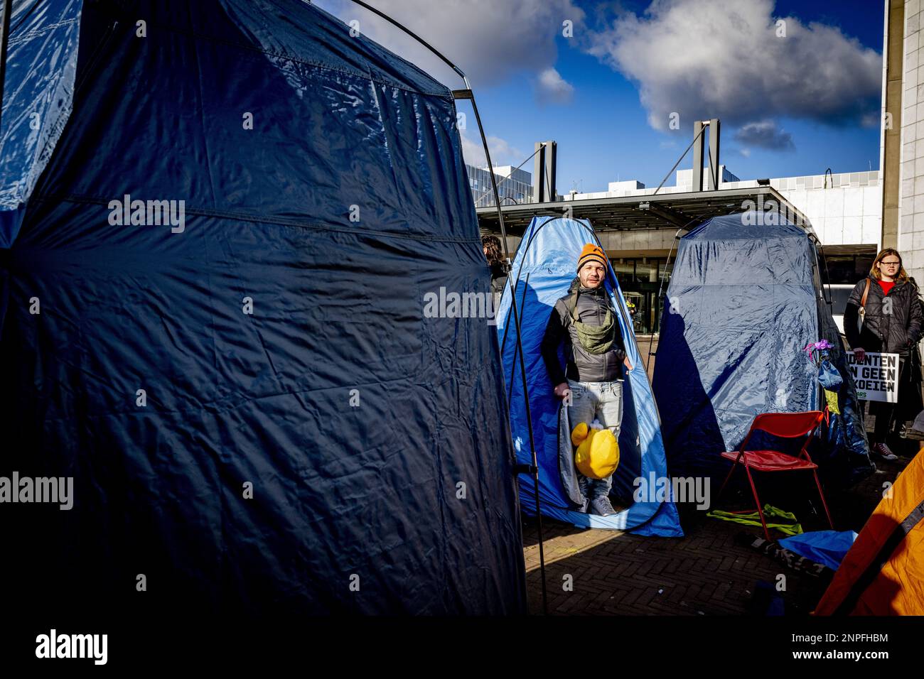 AMSTERDAM - Demonstrators with a tent at the stopera, demonstrating against vacancy in inner cities. In September 2021, a protest took place in Amsterdam for the right to affordable housing. ANP ROBIN UTRECHT netherlands out - belgium out Stock Photo