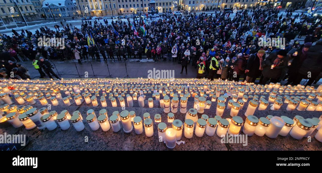 Helsinki, Finland - February 24, 2023: Grave candles at the Light will win over darkness event where candles were lit for honouring the victims of Rus Stock Photo