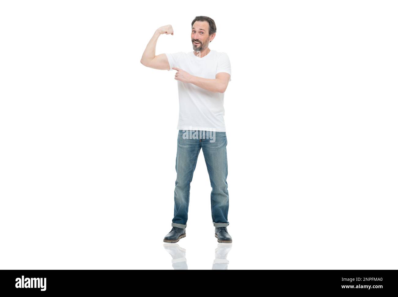 Finger Biceps mature strong man on background. photo of mature strong man pointing ...