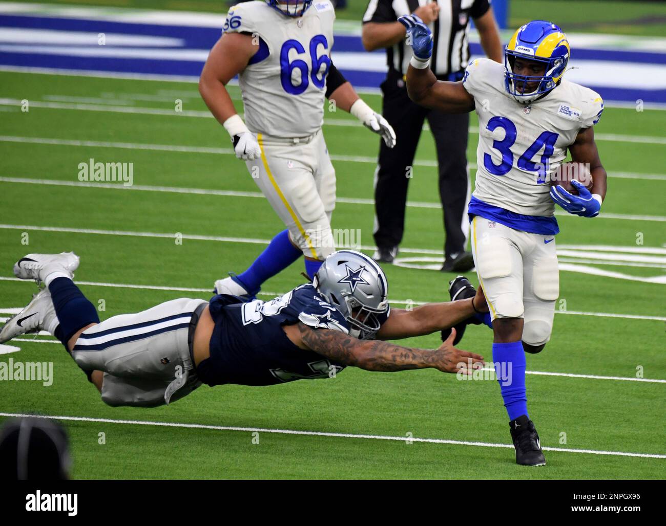 Running Back Malcolm Brown 34 Of The Los Angeles Rams Runs Past running-back-malcolm-brown-34-of-the-los-angeles-rams-runs-past