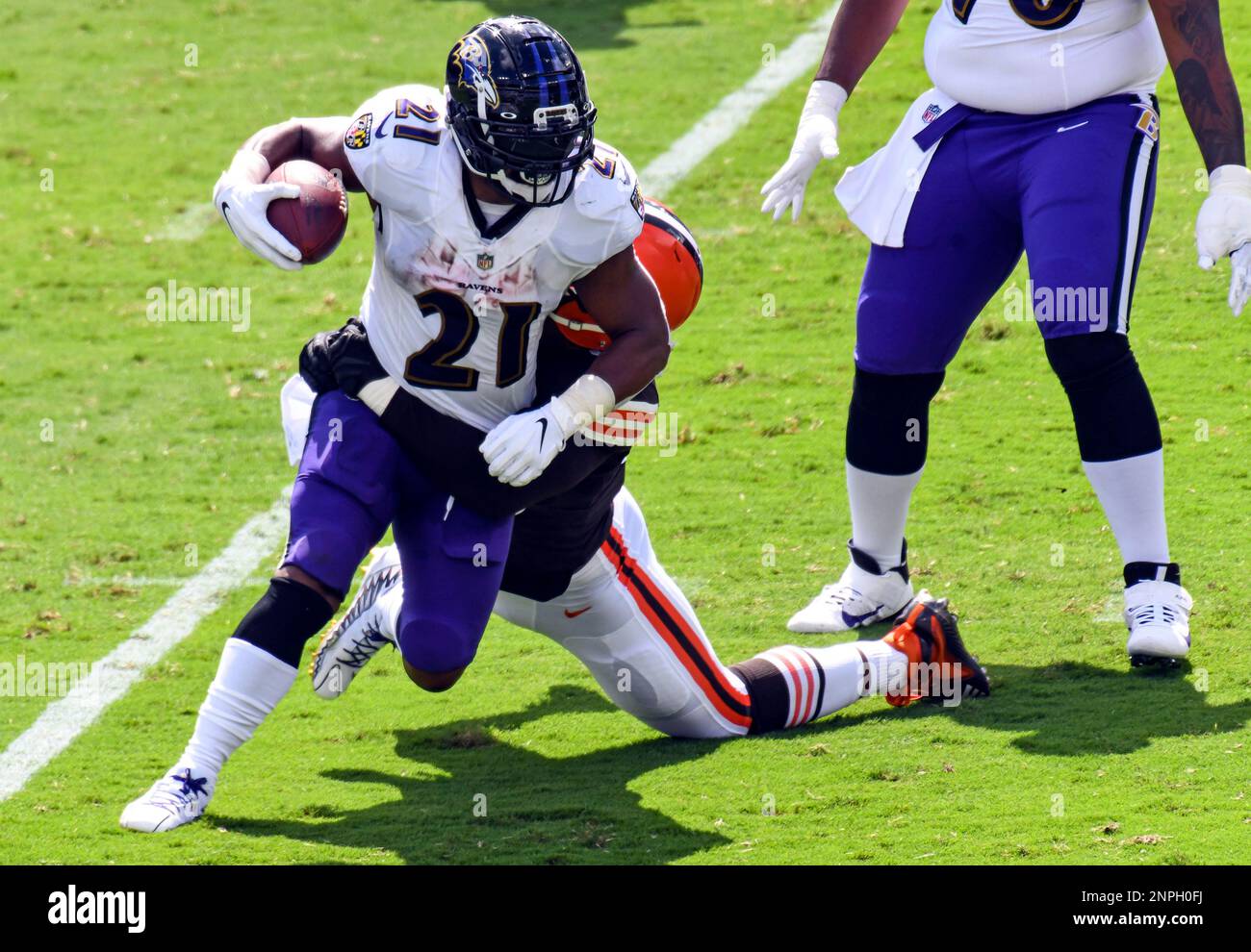 BALTIMORE, MD - SEPTEMBER 19: Baltimore Ravens running back Ty'Son Williams  (34) is congratulated by wide receiver Devin Duvernay (13) after his fumble  recovery for a touchdown during the Kansas City Chiefs