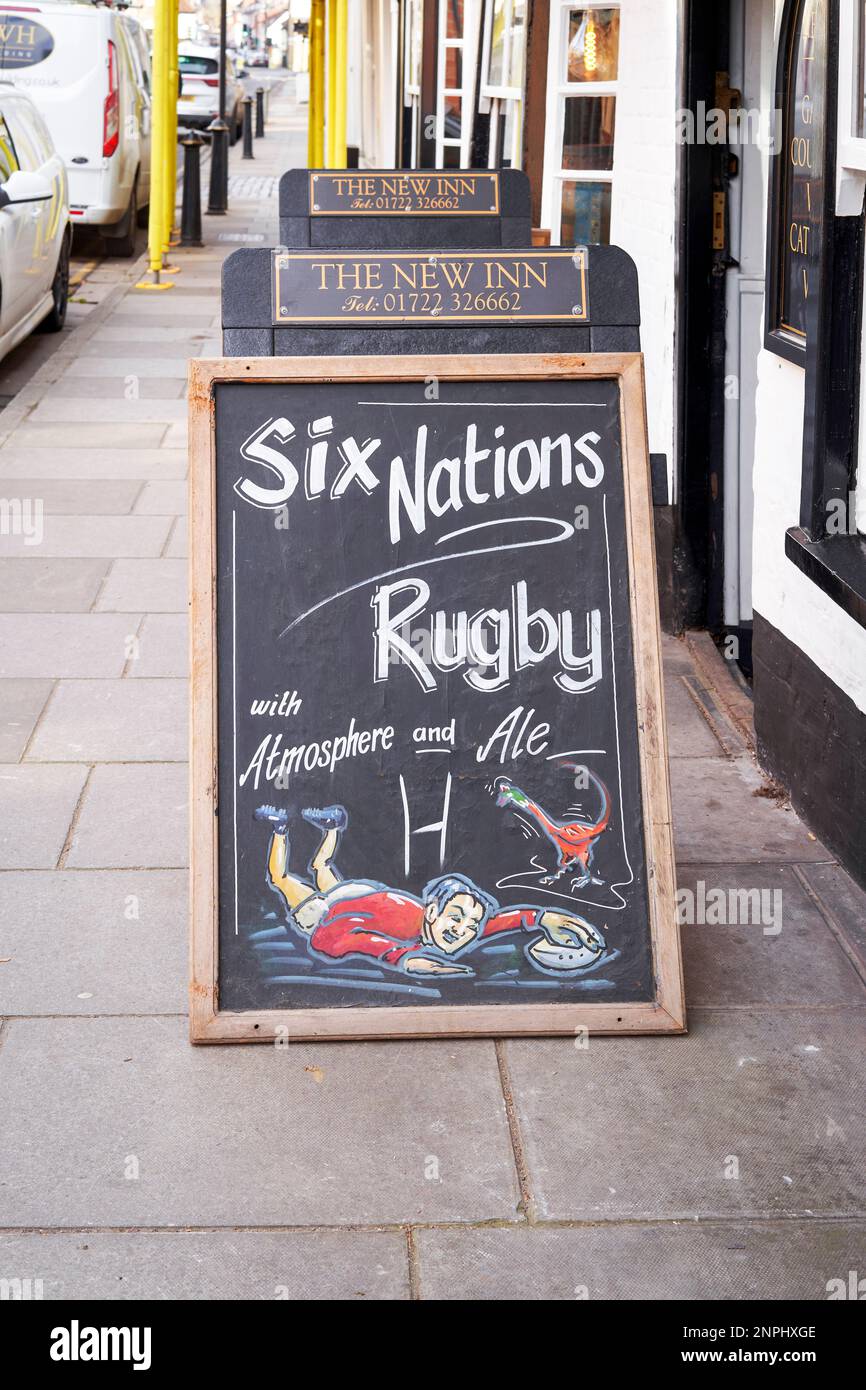 Pub black board on pavement advertising six nations rugby Stock Photo