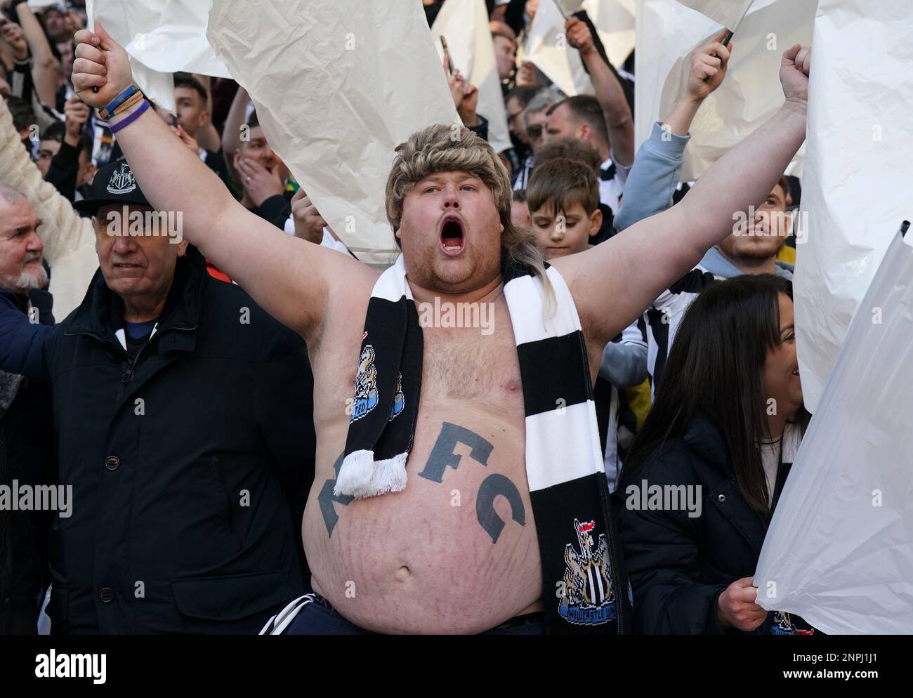 A Newcastle United fan in the stands the Carabao Cup Final match at