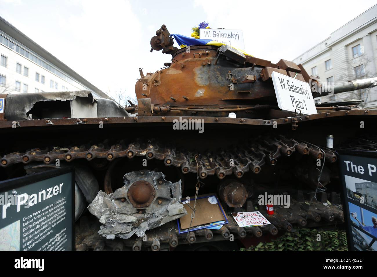 Germany, Berlin, 02/26/2023. A wrecked tank has stood in front of the Russian embassy in Berlin-Mitte since the anniversary of the Russian attack on Ukraine. The destroyed T-72 tank in front of the Unter Den Linden building as a memorial against the war. Stock Photo