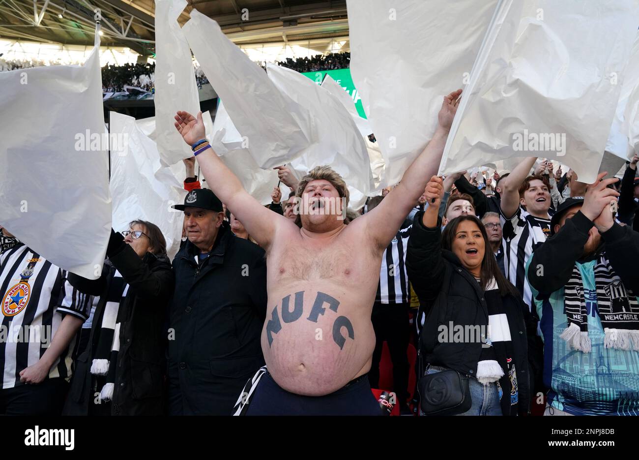 A Newcastle United fan in the stands the Carabao Cup Final match at