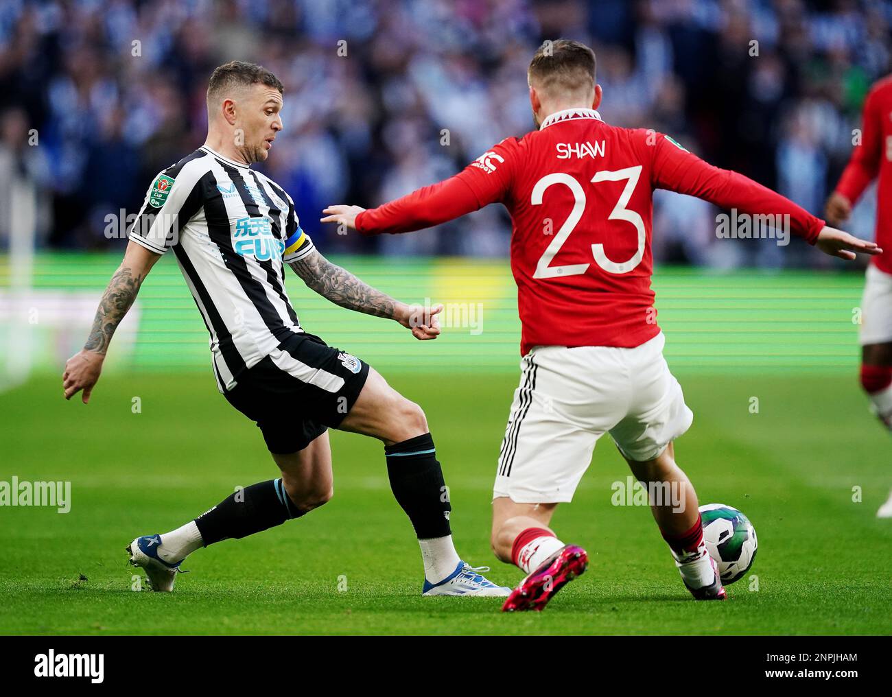 Newcastle United's Kieran Trippier (left) and Manchester United's Luke ...