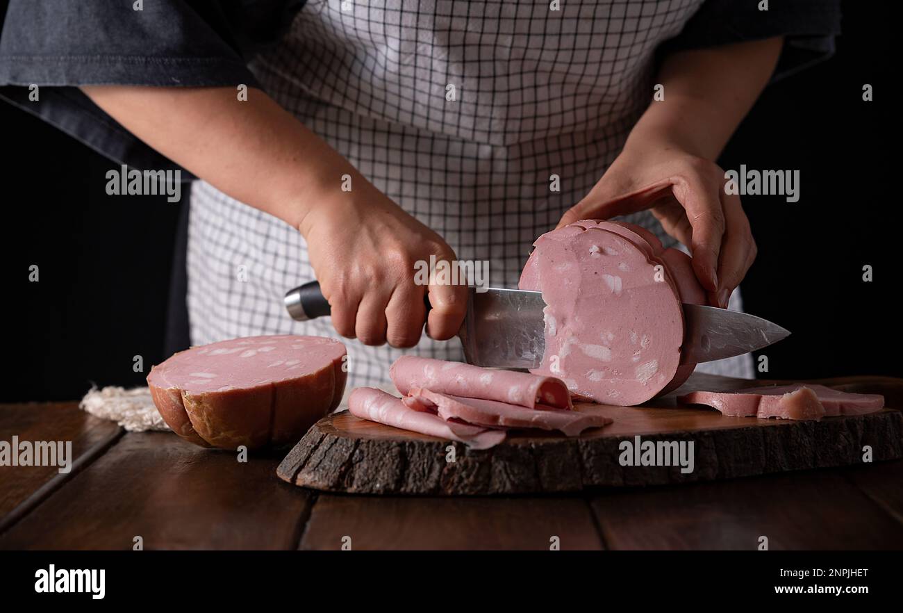 Mortadella. Traditional pork sausage with pistachios or black pepper