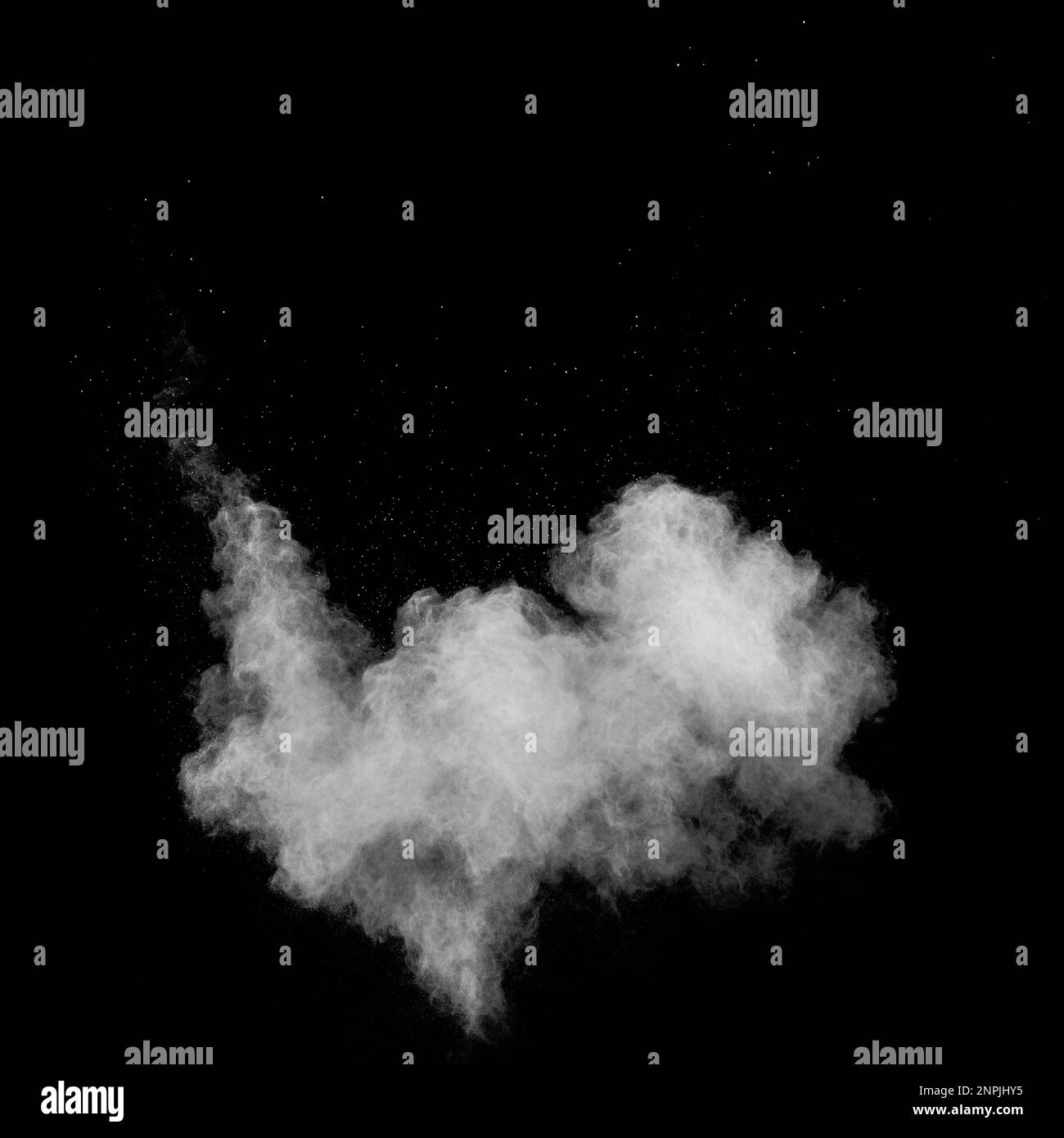 White powder explosion isolated on black background.White dust ...