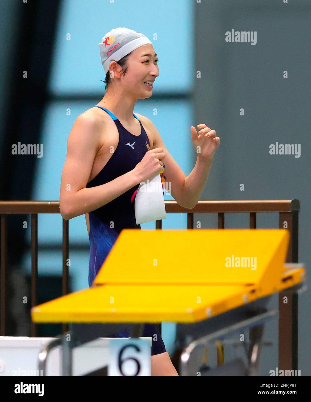 Japanese swimmer Rikako Ikee reacts after competing women 50meter