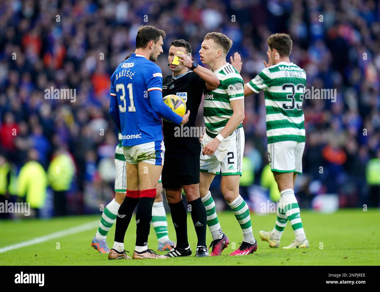 Rangers' Borna Barisic is shown a yellow card after exchanging words ...