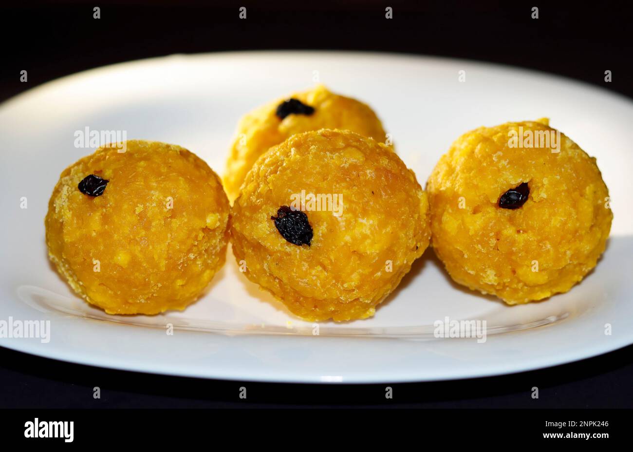 Closeup Image Of Indian Sweet Yellow Laddoo In White Background Stock ...
