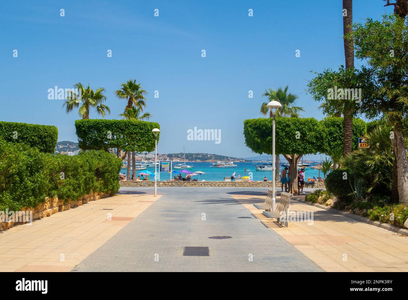 MAJORCA, SPAIN - 21ST MAY 22: A Path leading towards the beach and sea in Majorca Spain. People can be seen. Stock Photo