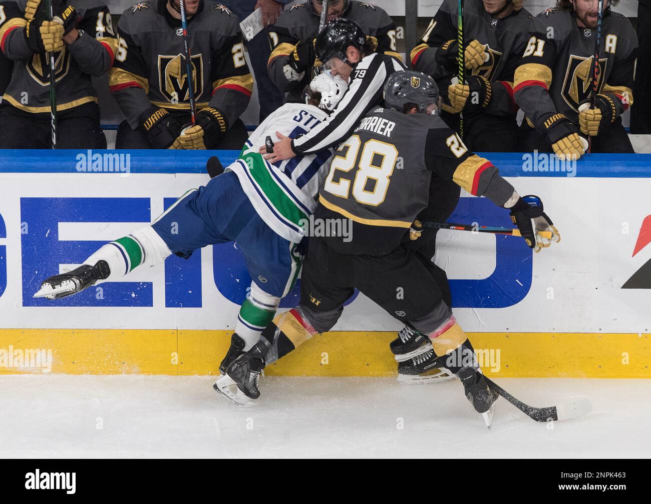 Vegas Golden Knights' William Carrier (28) and Vancouver Canucks' Troy