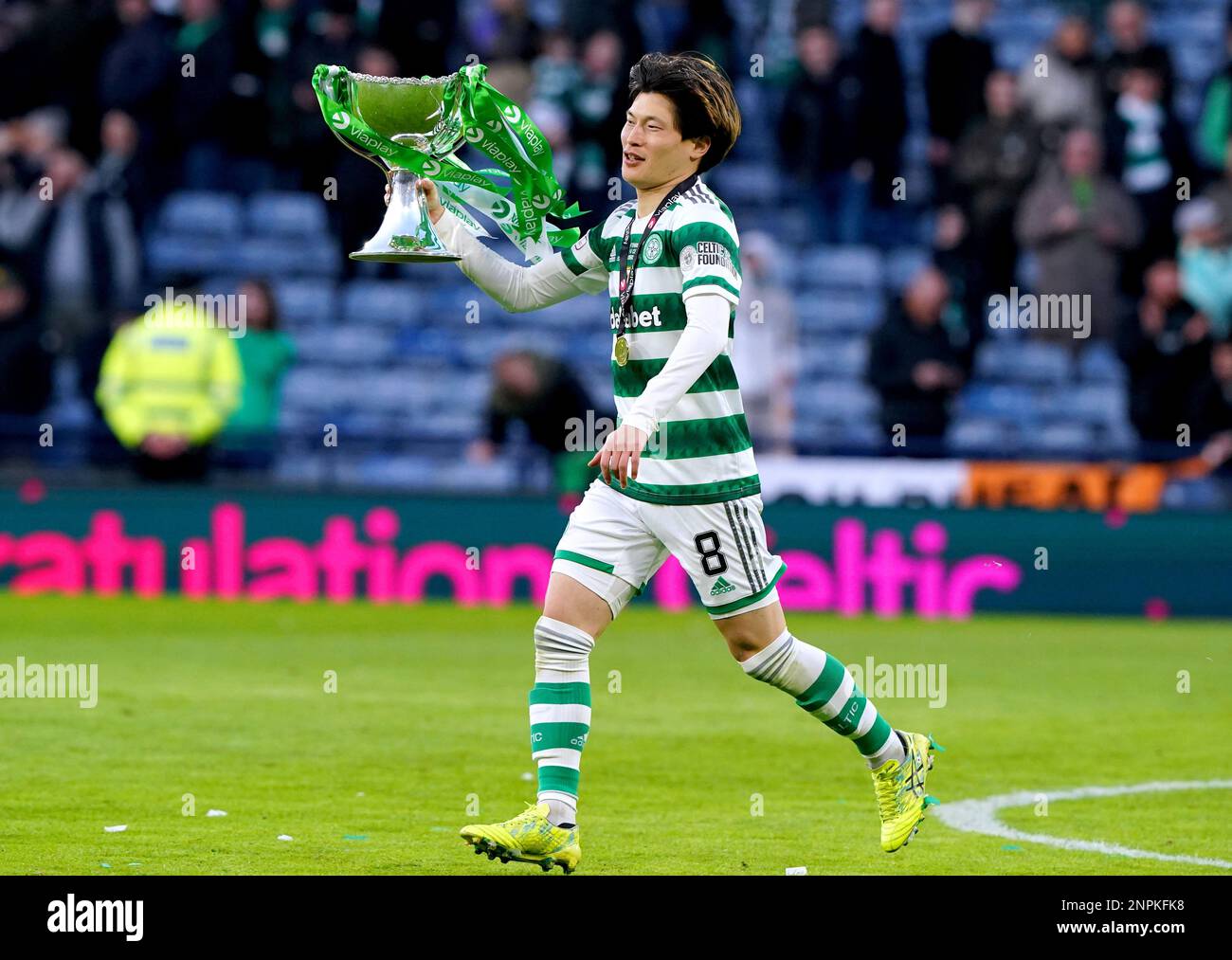 Celtic's Kyogo Furuhashi celebrates with the Viaplay Sports Cup trophy