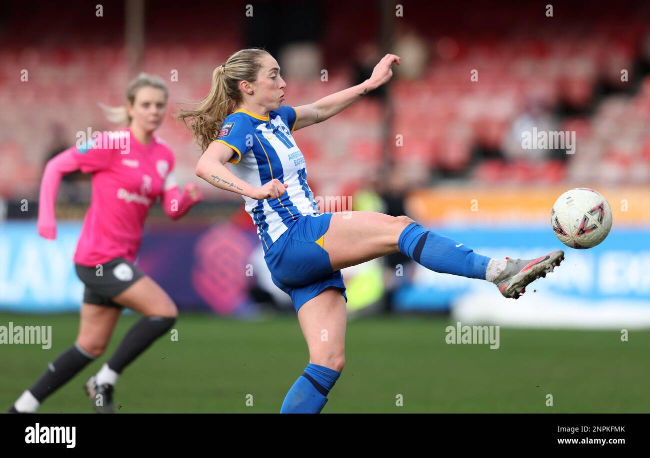 Crawley, UK. 26th Feb, 2023. Brighton's Megan Connolly stretches to connect with the ball during the Women's FA Cup fifth round match between Brighton & Hove Albion and Coventry United at the Broadfield Stadium. Credit: James Boardman/Alamy Live News Stock Photo
