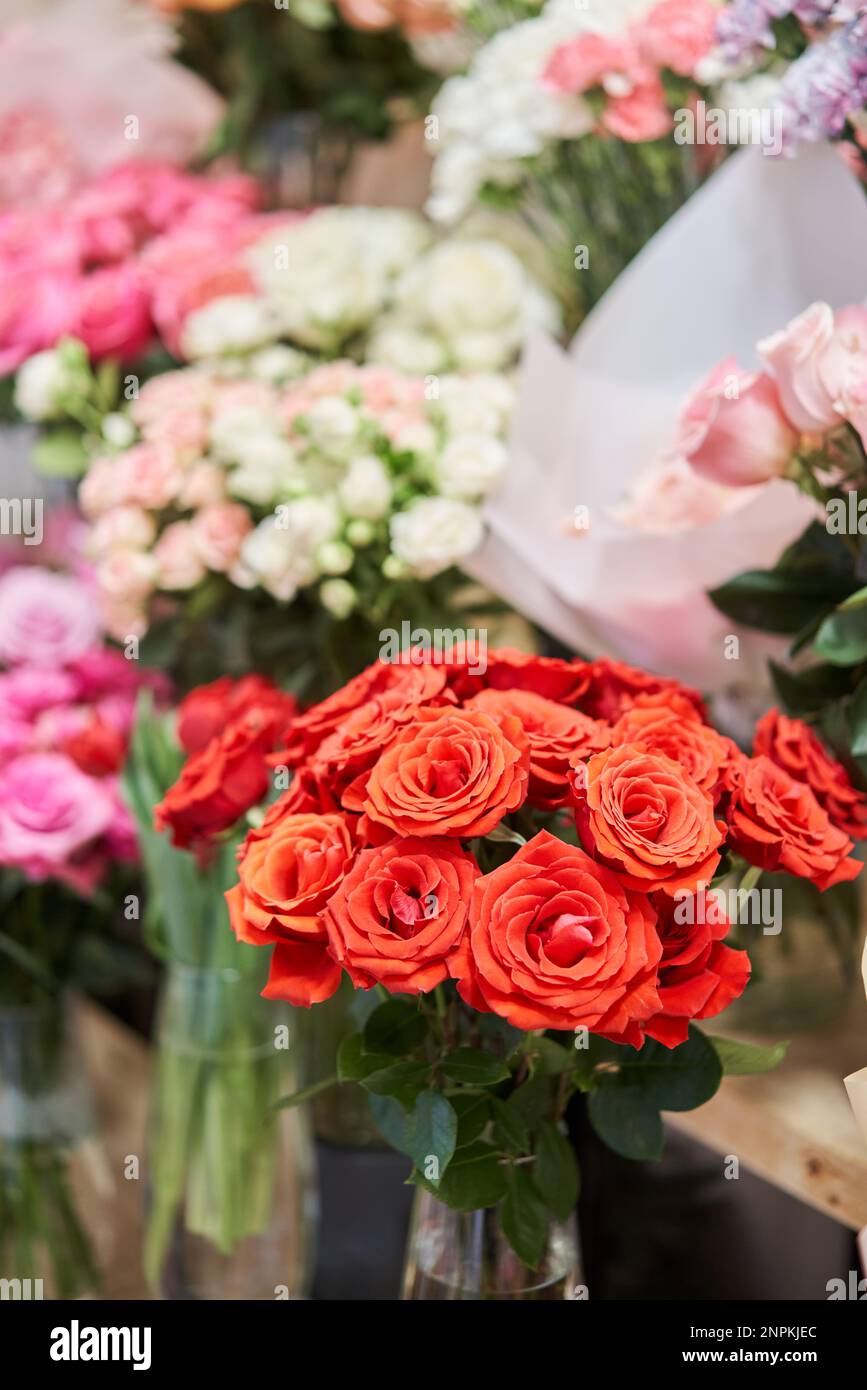 Flower shop concept. Different varieties fresh spring flowers in