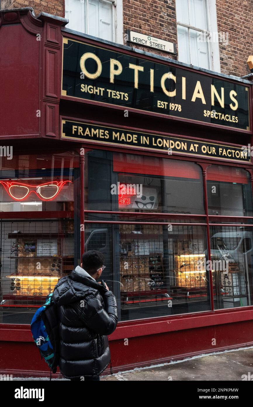 London, UK. 22nd February, 2023. A man glances at the window of Opera