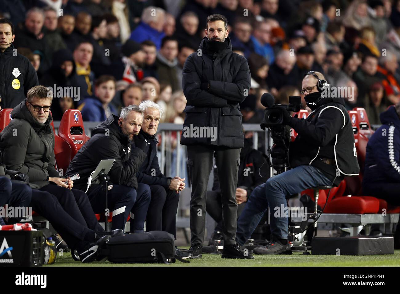 EINDHOVEN - (LR) PSV Eindhoven team manager Bas Roorda, PSV Eindhoven assistant coach Fred Rutten, PSV Eindhoven assistant coach Fred Rutten, PSV Eindhoven coach Ruud van Nistelrooij during the Dutch premier league match between PSV Eindhoven and FC Twente at Phillips stadium on 26 February 2023 in Eindhoven, Netherlands. ANP MAURICE VAN STONE Stock Photo