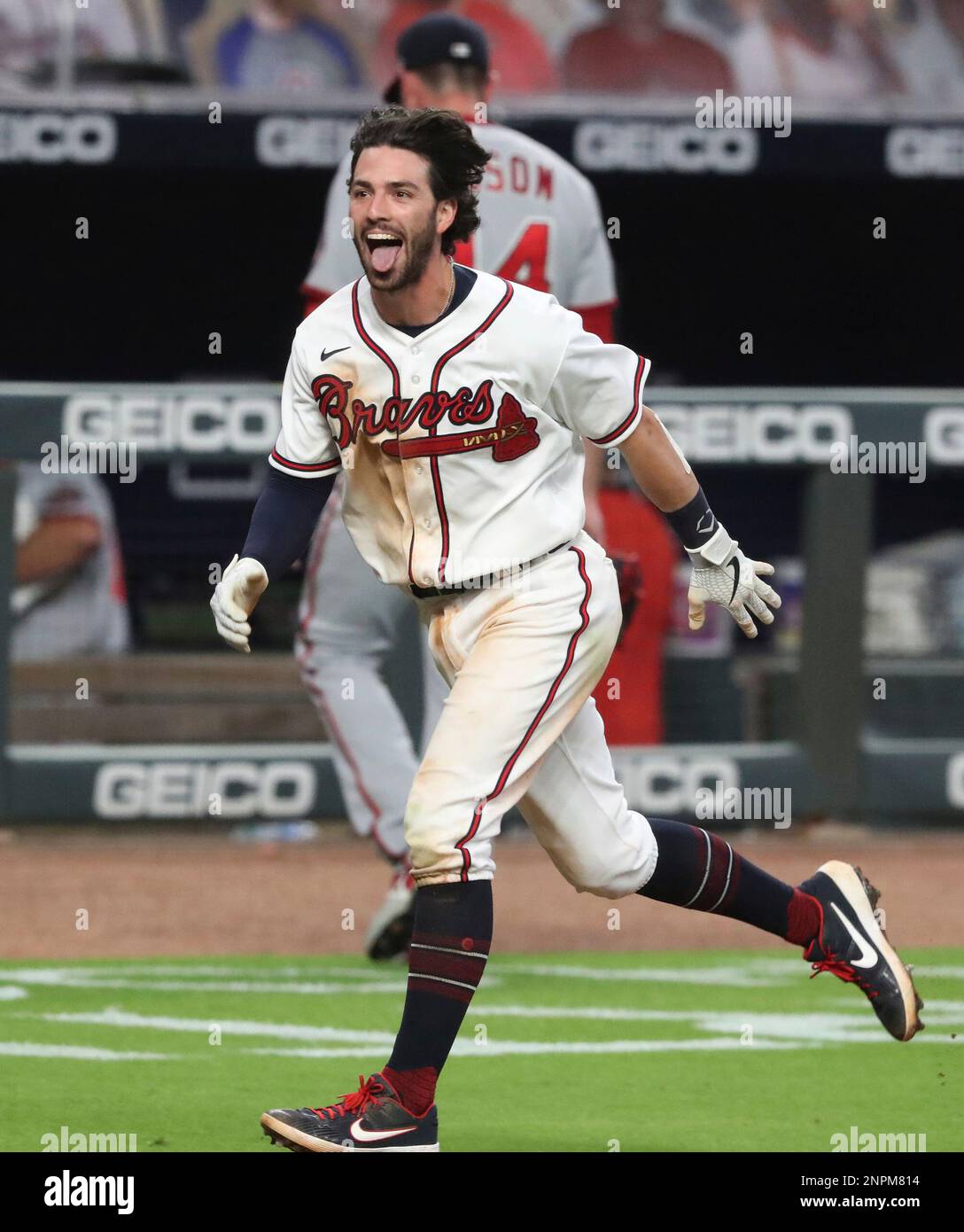 Atlanta Braves' Dansby Swanson celebrates his two-run home run as he rounds  the bases during the third inning of a baseball game against the Washington  Nationals Sunday, Aug. 15, 2021, in Washington. (