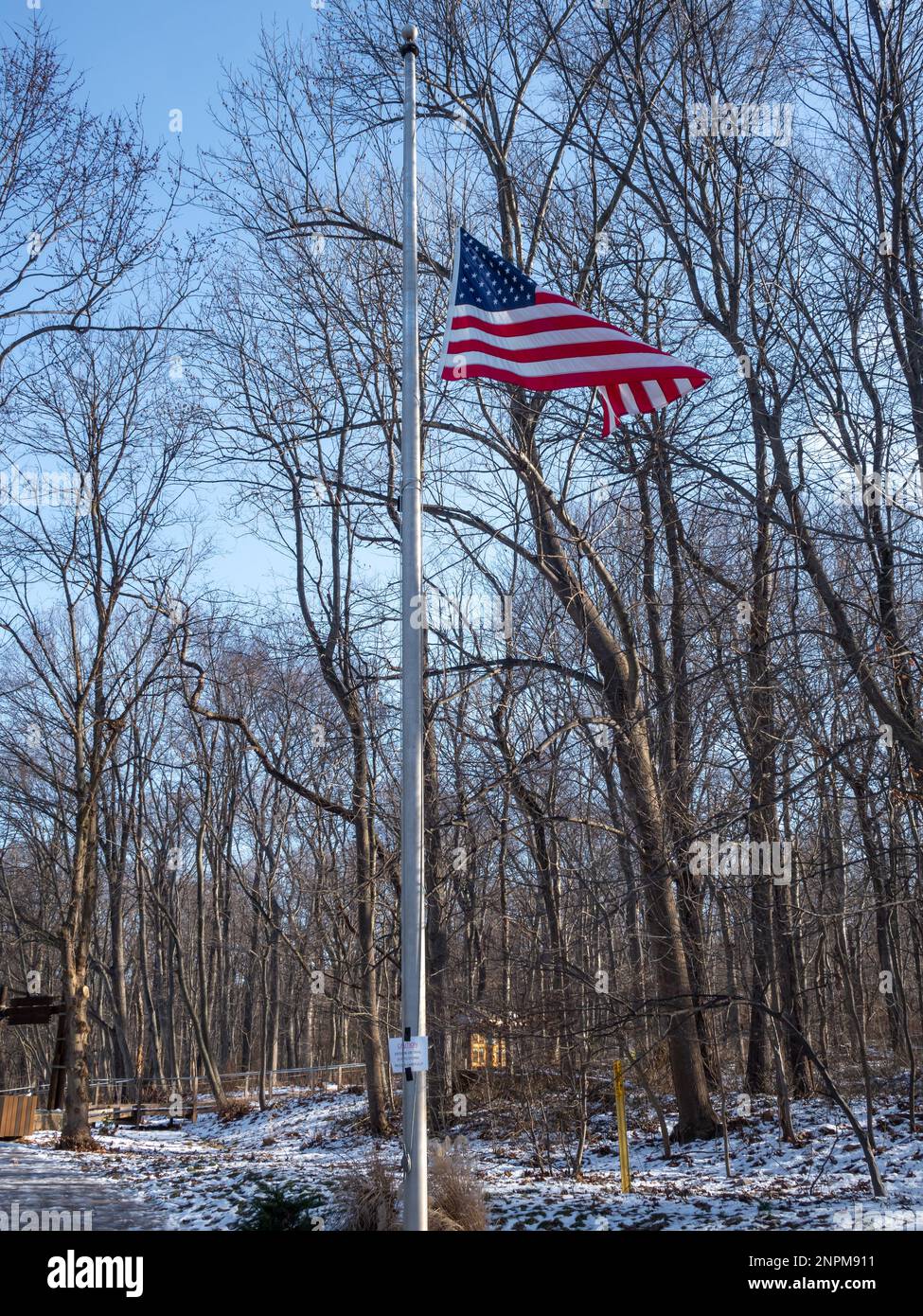 American flag in the reservation covered with snow in winter Stock Photo
