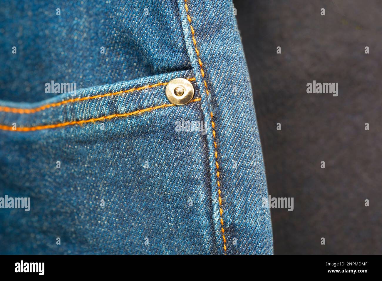 denim jeans belt loop and rivets Stock Photo - Alamy