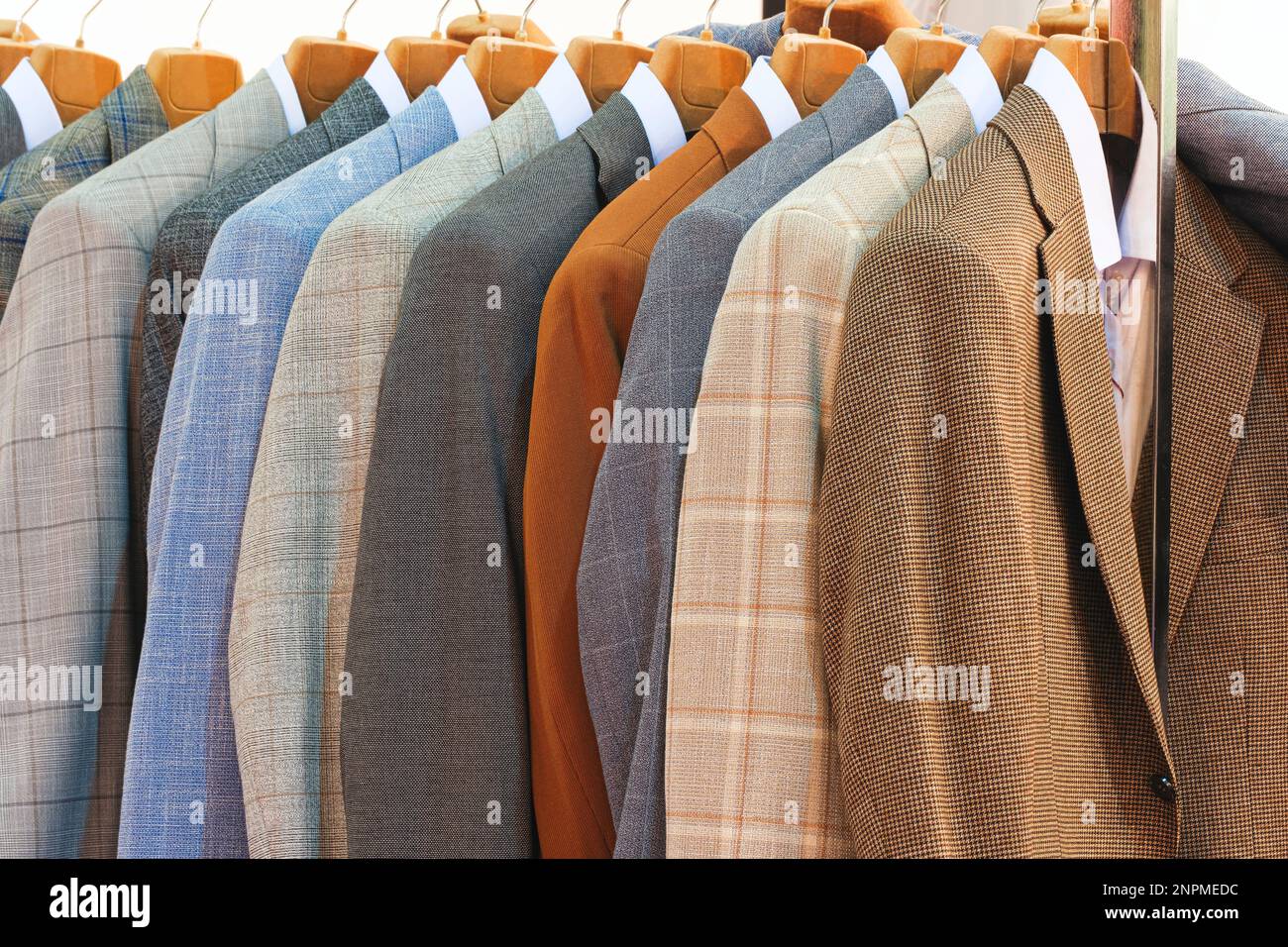 Men suits in a fashion shop Stock Photo