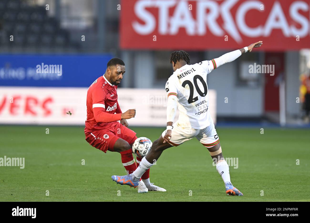 Antwerp's Gyrano Kerk and OHL's Hamza Mendyl fight for the ball during a soccer match between Oud-Heverlee Leuven and Royal Antwerp FC, Sunday 26 February 2023 in Leuven, on day 27 of the 2022-2023 'Jupiler Pro League' first division of the Belgian championship. BELGA PHOTO TOM GOYVAERTS Stock Photo