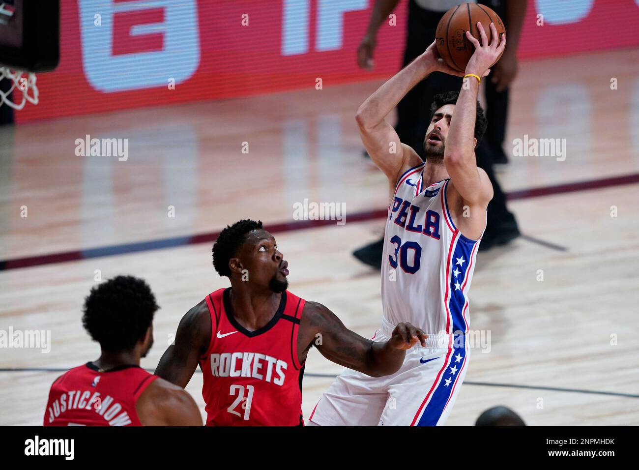 Philadelphia 76ers' Furkan Korkmaz (30) shoots over Houston Rockets ...