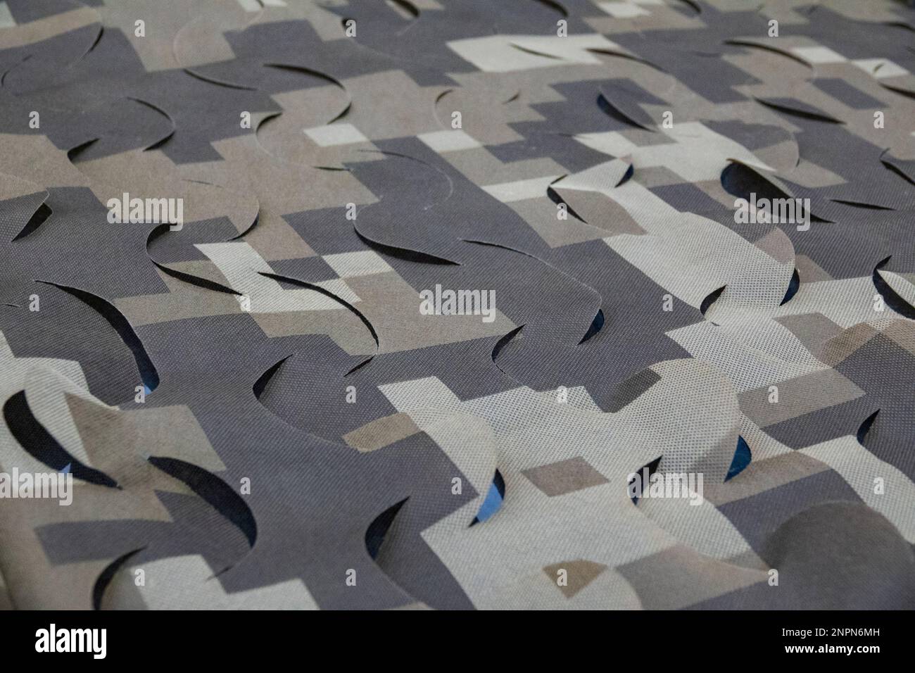 Military camouflage background. Olive camo net Stock Photo